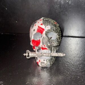 Decorative Skull with Red and Black Accents